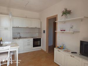 A kitchen or kitchenette at Birgi holiday home