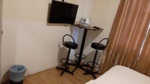 TV a/nebo společenská místnost v ubytování My Family Hotel