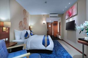 TV o dispositivi per l'intrattenimento presso Aston Inn Gideon Batam