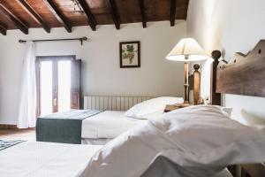 Postel nebo postele na pokoji v ubytování Hotel rural Entreviñas