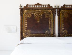 Postel nebo postele na pokoji v ubytování Hotel Ravesi