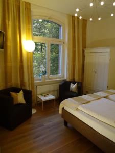 Postel nebo postele na pokoji v ubytování Villa Am Park