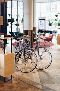 two bikes are parked in a room at PURO Wrocław Stare Miasto in Wrocław