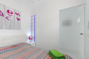 Кровать или кровати в номере Mareverde, Las Americas