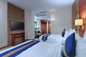 TV o dispositivi per l'intrattenimento presso Aston Inn Gideon Batam