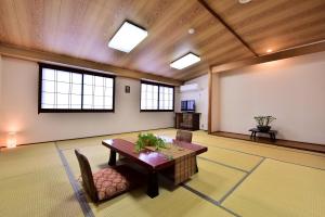 Posezení v ubytování Takenoya Ryokan (Guest House Takenoya)