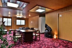 Posezení v ubytování Takenoya Ryokan (Guest House Takenoya)
