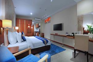 TV o dispositivi per l'intrattenimento presso Aston Inn Gideon Batam