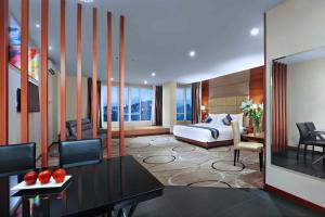 Letto o letti in una camera di Aston Inn Gideon Batam