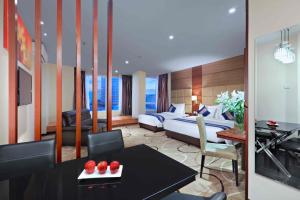 Letto o letti in una camera di Aston Inn Gideon Batam
