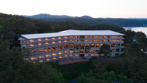 an aerial view of a hotel on a hill at Jodogahama Park Hotel in Miyako