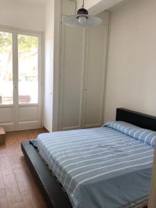 Ένα ή περισσότερα κρεβάτια σε δωμάτιο στο Casa Vacanze Palinuro Trivento +13 φωτογραφίες