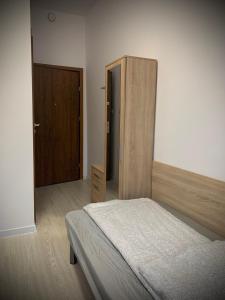 Łóżko lub łóżka w pokoju w obiekcie Hostel Sportowa