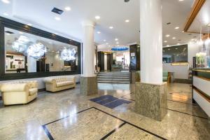 The lobby or reception area at Hotel Royal Torino Centro Congressi