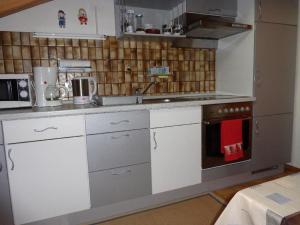 Η κουζίνα ή μικρή κουζίνα στο Ferienwohnung Burgenblick