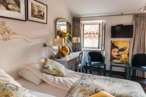 Posteľ alebo postele v izbe v ubytovaní Prijeko Palace + 37 fotografií