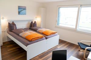 Postel nebo postele na pokoji v ubytování Anstatthotel Schafisheim - self-check-in
