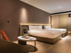 En eller flere senger på et rom på Novotel Shanghai Clover