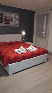 Postel nebo postele na pokoji v ubytování B&B Casa Taty