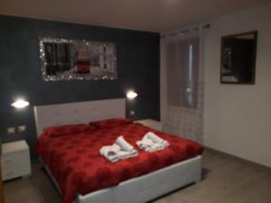 Postel nebo postele na pokoji v ubytování B&B Casa Taty