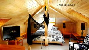 Ein Bett oder Betten in einem Zimmer der Unterkunft zentralclub apartamento El Nido de Somiedo