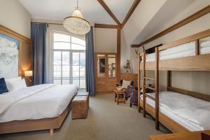 Posteľ alebo postele v izbe v ubytovaní Hotel Eden Rock