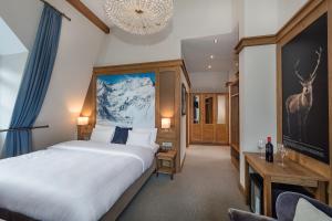 Posteľ alebo postele v izbe v ubytovaní Hotel Eden Rock