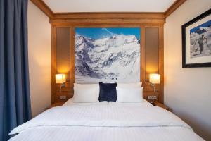 Posteľ alebo postele v izbe v ubytovaní Hotel Eden Rock