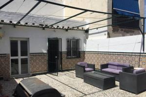 Posedenie v ubytovaní CASA REFORMADA CON TERRAZA/WIFI/AIRE ACONDICIONADO
