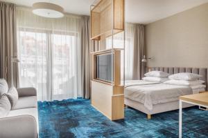 Postel nebo postele na pokoji v ubytování Hotel Morski Widok + 32 fotografií