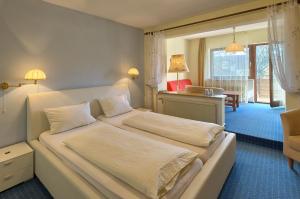 Postel nebo postele na pokoji v ubytování Hotel Bären