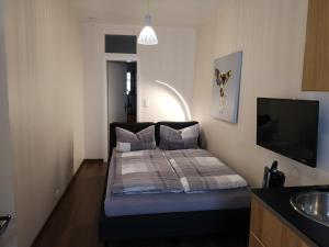 Ένα ή περισσότερα κρεβάτια σε δωμάτιο στο Apartments Junger-Moritz
