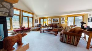a living room filled with furniture and a fireplace at Snowcreek #760 condo in Mammoth Lakes