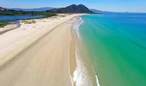 an aerial view of a beach with the ocean at HOSTAL FORMOSO in San Francisco +11 photos