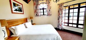 Postelja oz. postelje v sobi nastanitve 124 Fairways Drakensberg Gardens