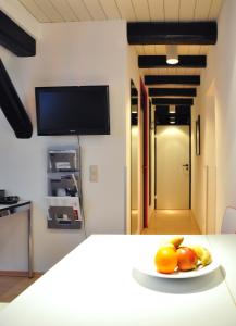 TV a/nebo společenská místnost v ubytování Suite „Hannover“ - modernes Apartment in Fachwerkhaus