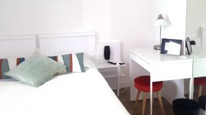 Cama ou camas em um quarto em Hotel De L'Europe