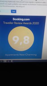 a computer screen with a sign on a website at Apartments New Charming in Senj