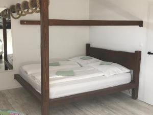 Postel nebo postele na pokoji v ubytování Štúdio apartmán Prievidza centrum