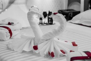 Posteľ alebo postele v izbe v ubytovaní Erossuite GuestHouse