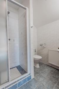 Kúpeľňa v ubytovaní Hotel U Valdické brány