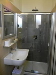 Koupelna v ubytování Hotel Parma Mare