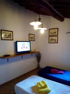A bed or beds in a room at Appartamento Martina