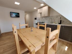 Kuchyň nebo kuchyňský kout v ubytování Apartmány Knížkovi