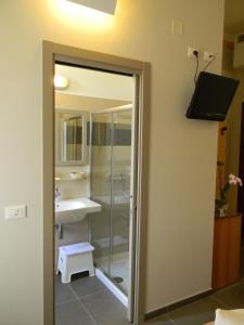 Koupelna v ubytování Hotel Parma Mare