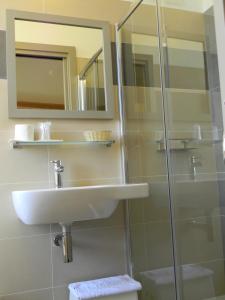 Koupelna v ubytování Hotel Parma Mare