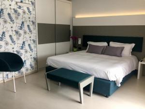 Voodi või voodid majutusasutuse Hotel L'Approdo toas
