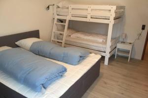 Posteľ alebo postele v izbe v ubytovaní Groot appartement in Aparthotel met prachtig uitzicht
