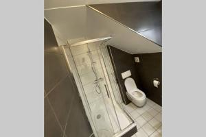 Kúpeľňa v ubytovaní Groot appartement in Aparthotel met prachtig uitzicht