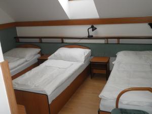 Letto o letti in una camera di Hotel Le Café